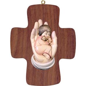 Cross with protecting hand girl