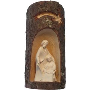 Holy family in a tree trunk